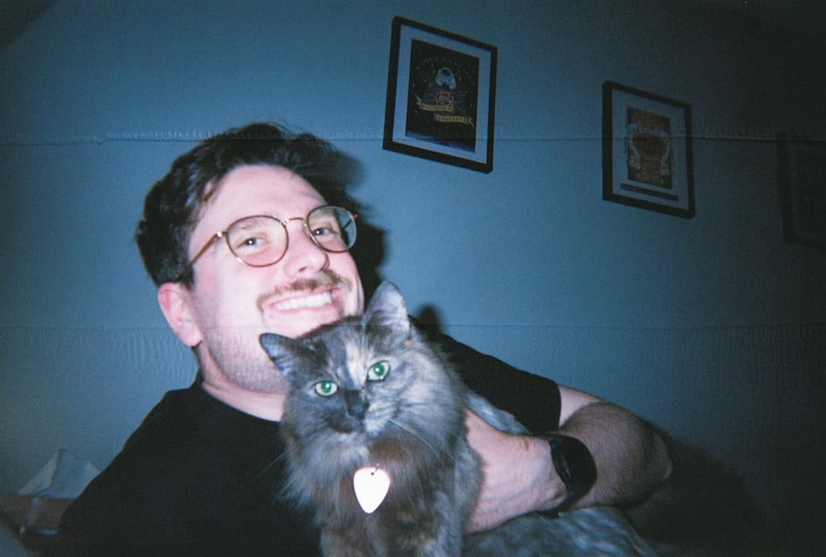 Stephen Thomas, the founder of Movari, with his cat Vesper
